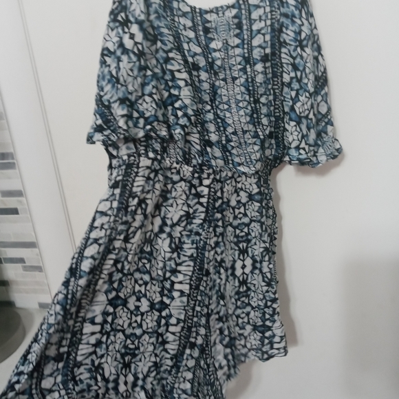 Olivaceous Sleeveless Romper. Adjustable Straps. Layered Ruffle top - Picture 7 of 8